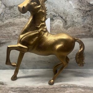 Elegant Gold Horse Sculpture